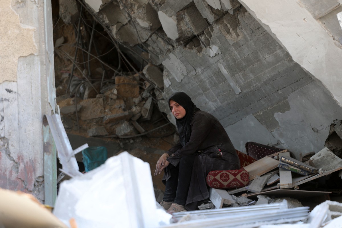 Gaza Woman Rubble.jpg