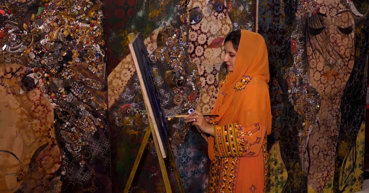 An artist using Balochi jewelery in paintings