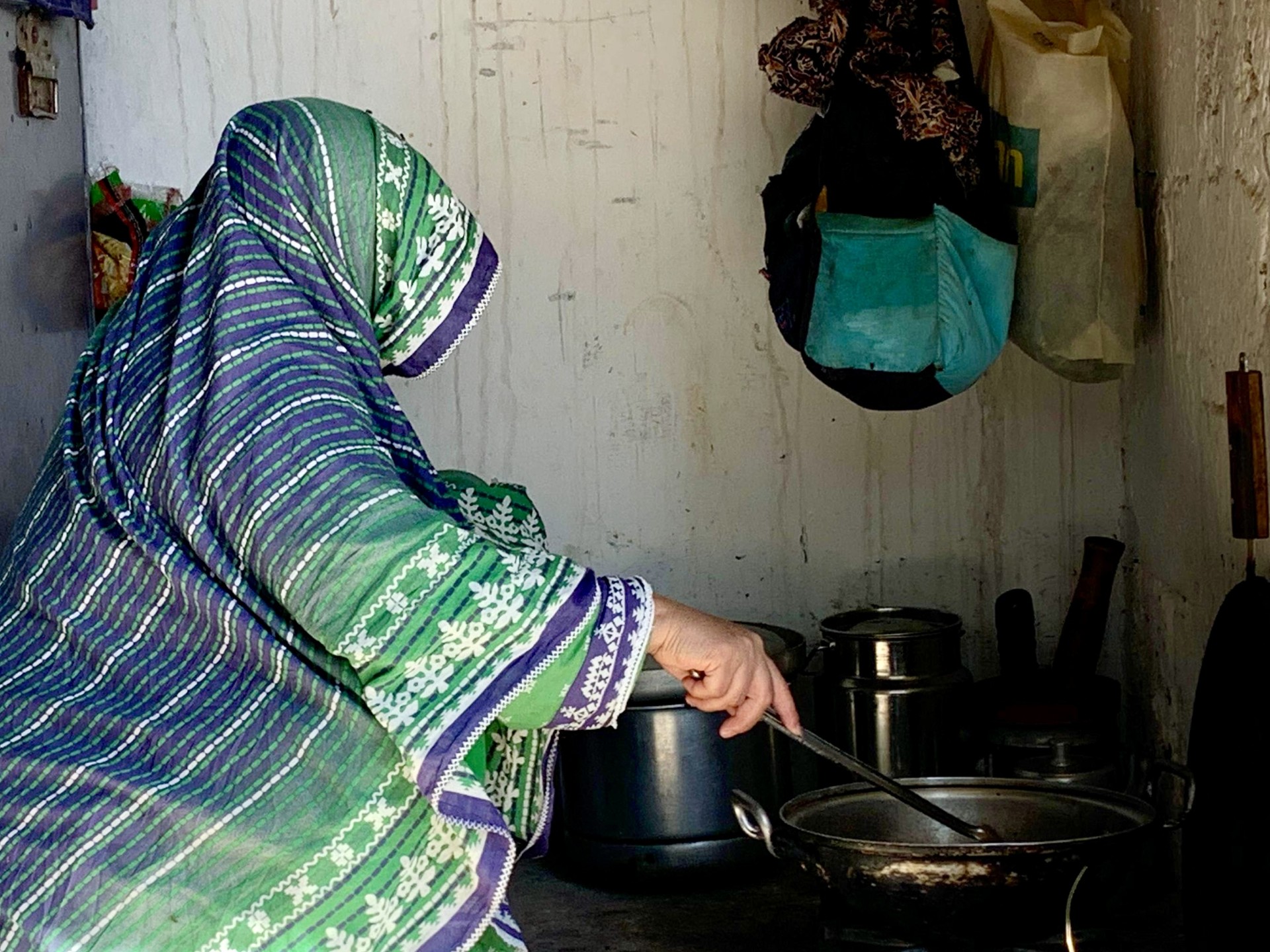 HEATWAVE WOMAN COOKING.jpg